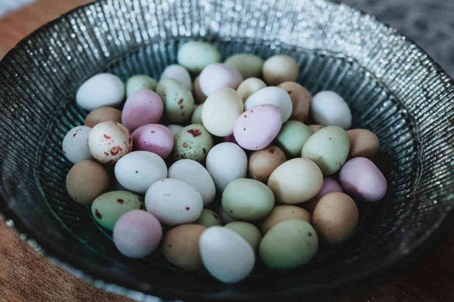 A bowl full of chocolate eggs